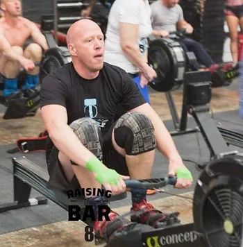 Lee on the rower at a competition